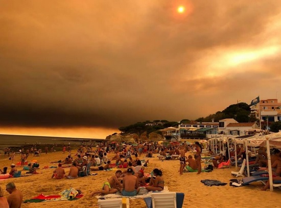 Portugalia: Gęsty dym z pożarów przysłania słońce na plażach - GospodarkaMorska.pl